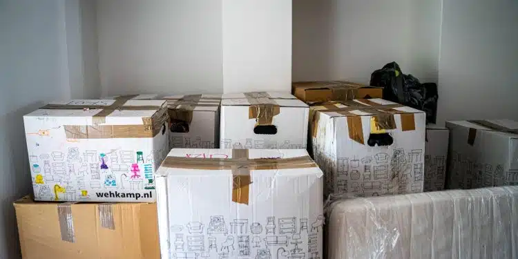 brown cardboard boxes on brown wooden table